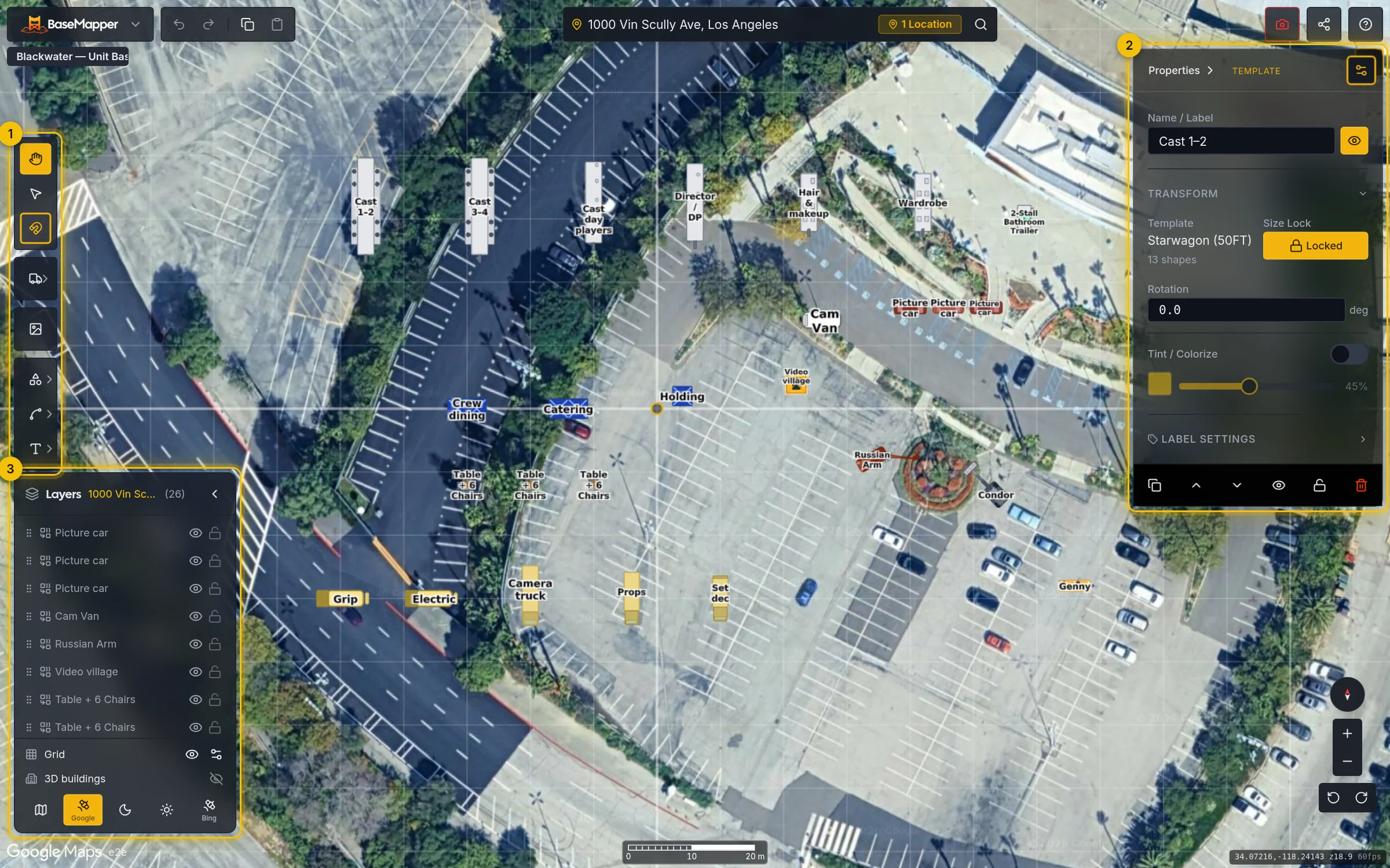 The BaseMapper map editor with a base camp laid out: trailers, trucks and tents on the lot.